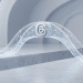 A minimalist 3D editorial photograph showing a glowing bridge made of light threads spanning a chasm. The Threads logo is positioned in the centre of the bridge, with subtle shapes representing the X and Bluesky logos on one side against a clean, light grey background.