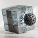 A minimalist 3D editorial graphic showing a sleek glass and metal cube being fractured by a heavy, metallic chain-link sphere, symbolising the impact of blockchain-enforced data rights over centralised platforms.
