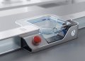 Minimalist 3D render of a cracked reservoir draining liquid beside an emergency pause button, representing the Bitcoin Liquid Network exploit.